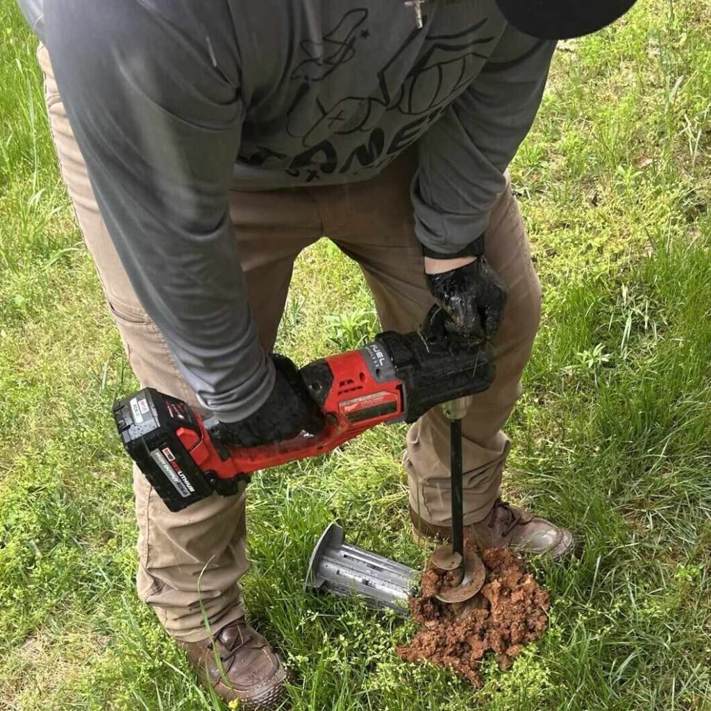 termite bait station being installed during a termite treatment in Huntsville AL